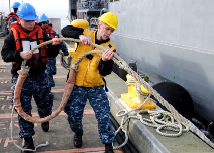 Sailors prepare USS Ford for departure. (8407755731)
