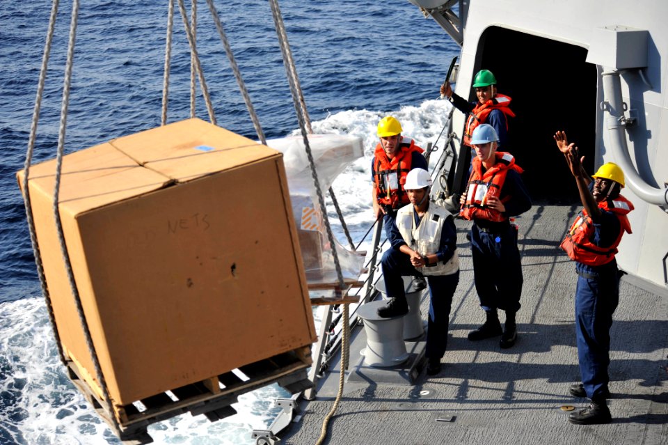 Sailors receive supplies during a replenishment-at-sea. (8244608520)