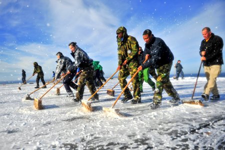 Sailors scrub the flight deck of USS Carl Vinson. (8448065208)