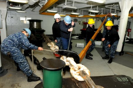 Sailors secure the starboard anchor chain aboard USS Bonhomme Richard. (8413081069)