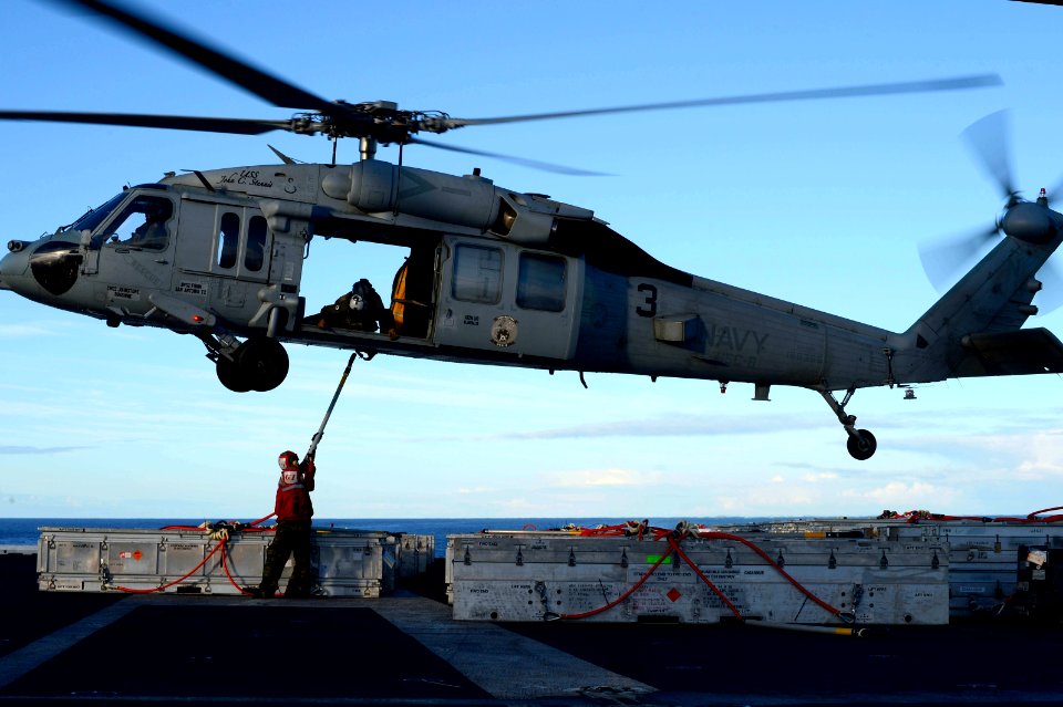 Sailors offload ordnance. (8671750501)
