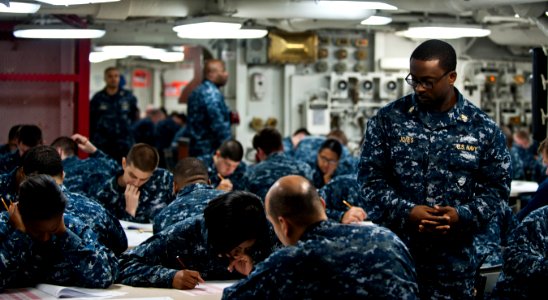 Sailors take an advancement exam. (8540160944)