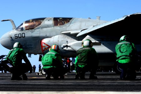 Sailors wait for an EA-6B to launch. (8573734899)