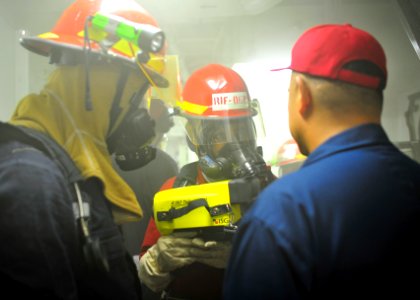 Sailors participate in fire drill 300414-N-KL617-024