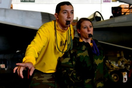 Sailors practice directing aircraft at sea. (8284405960)