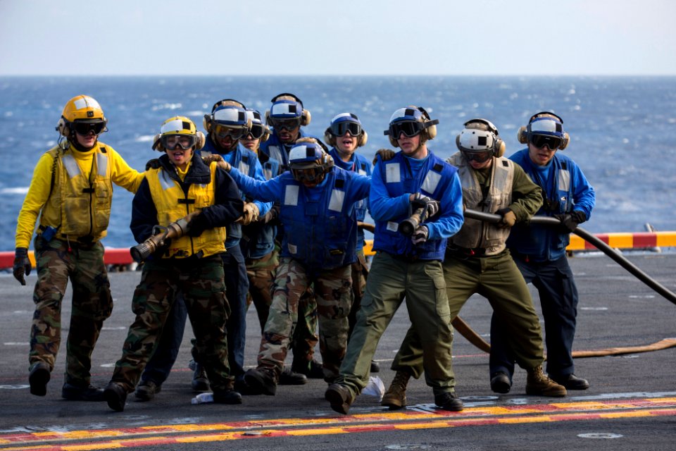 Sailors practice firefighting at sea. (8572073052)