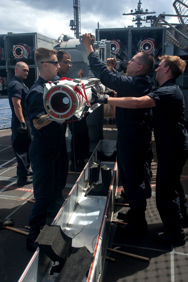 Sailors prep ESSM for launch 140905-N-TP834-570