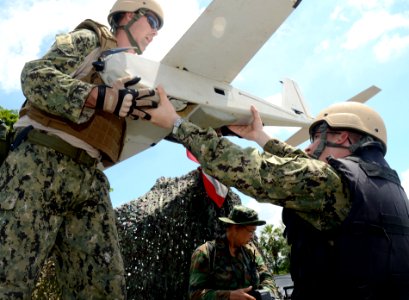 Sailors prepare a UAV