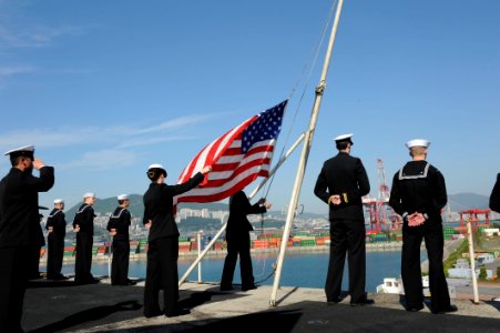 Sailors raise the ensign. (8735657071) photo