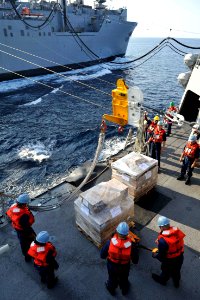 Sailors receive supplies during a replenishment-at-sea. (8243540183)