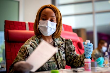 Sailors take care of quarantined shipmates from USS Kidd 200511-N-VN584-1229 (49913383311)