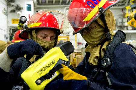 Sailors use a thermal imager at sea. (8428933405)