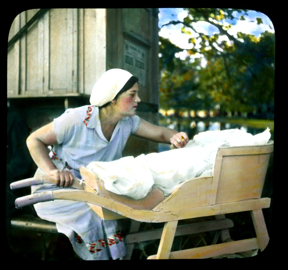 Saint Petersburg woman with a child in a baby carriage