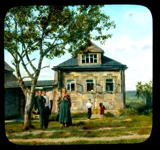 Saint Petersburg family in front of a house, near Leningrad photo