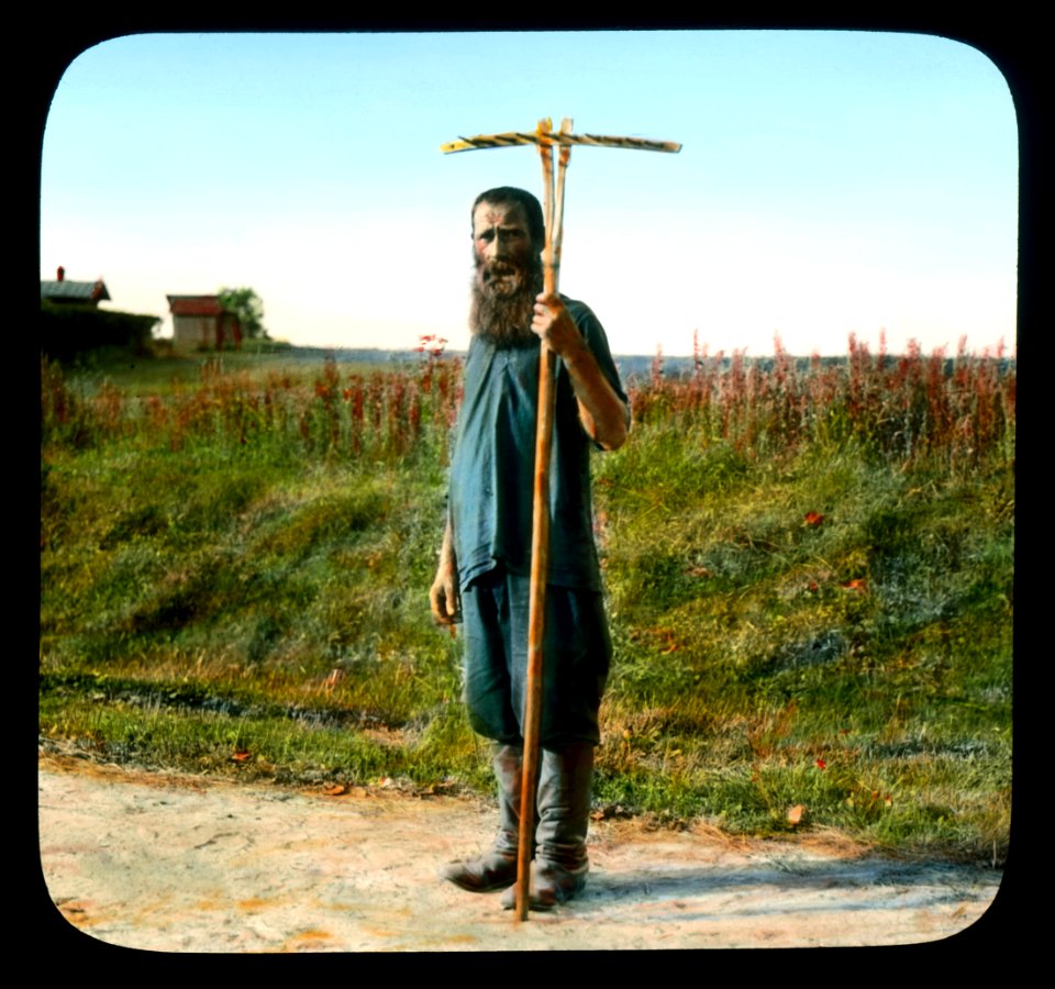 Saint Petersburg man with a rake, near Leningrad