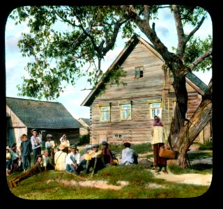 Saint Petersburg villagers in front of a house, near Leningrad photo