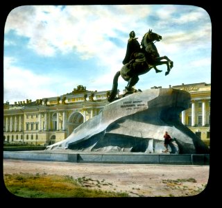 Saint Petersburg. Peter the Great Monument (The Bronze Horseman) on Senatskaia Ploshchad', with the Admiralty Building in the back photo