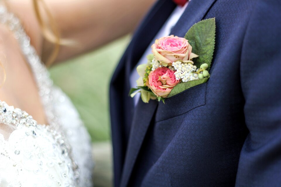 Coat flower groom photo