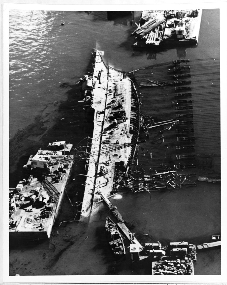 Salvage work on USS Utah (AG-16) 13 February 1944 (NH 64301)