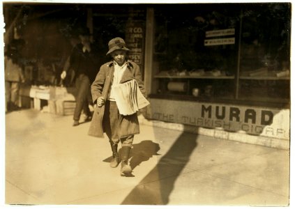Sam Pine, 8-year-old truant newsboy, who lives at 717 W. California St. Said- 'I was late getting up and don't want to get the rubber tube fo(r) being tardy so I staid away to-day.' LOC nclc.04024 photo