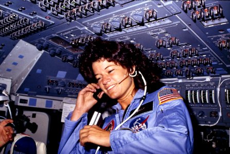 Sally Ride, America's first woman astronaut communitcates with ground controllers from the flight deck - NARA - 541940