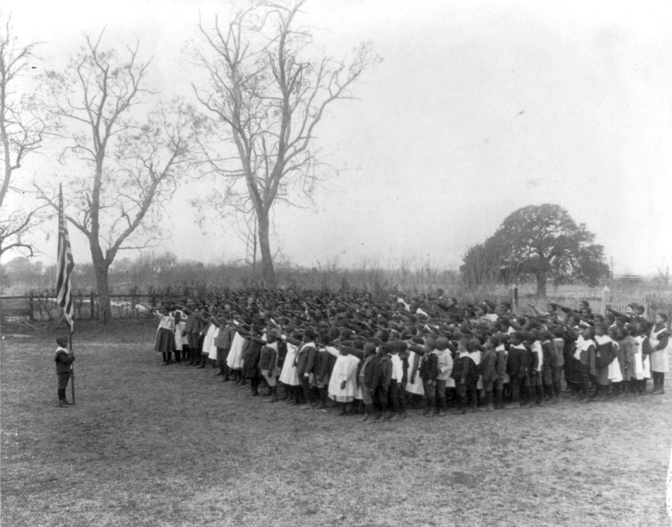 Saluting the flag at the Whittier Primary School LCCN2001703861 (cropped)