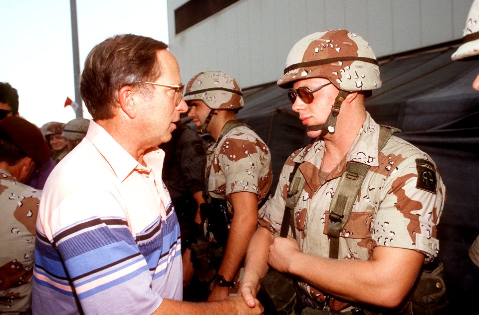 Sam Nunn of Georgia greets a member of the 82nd Airborne Division