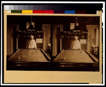 Samuel Clemens, half-length portrait, standing at end of pool table LCCN99400615