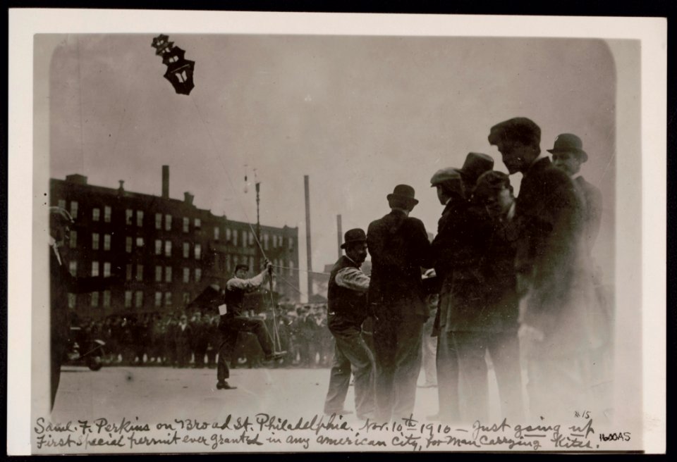 Samuel F. Perkins on Broad St., Philadelphia, Nov. 10th, 1910 - just going up First special permit ever granted in any American city, for man carrying kites. LCCN2017645646