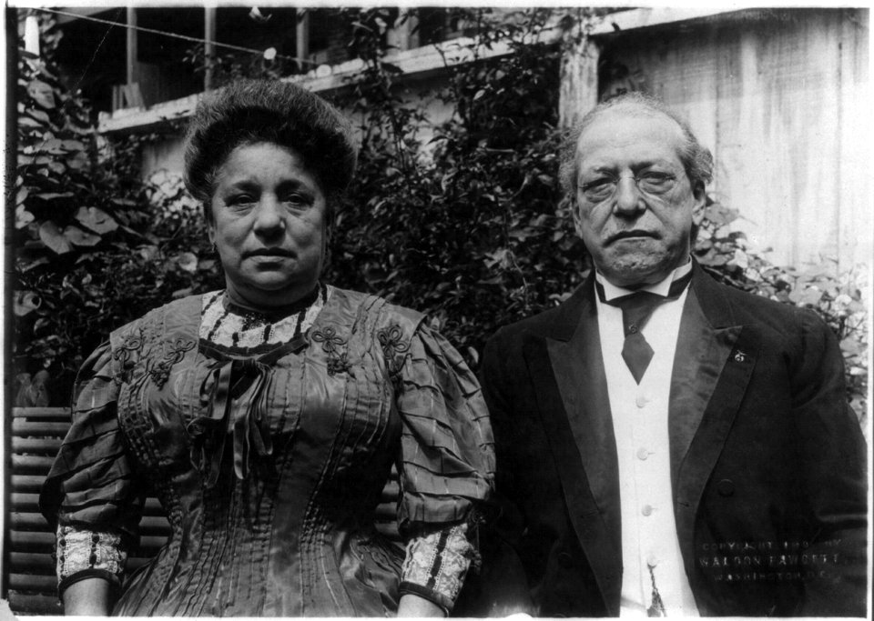 Samuel Gompers, 1850-1924, half-length portrait, standing, facing left, and wife Sophia Julian Gompers LCCN2005680065