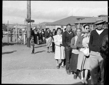 San Bruno, California. Supper time^ Meal times are the big events of the day within an assembly ce . . . - NARA - 537932