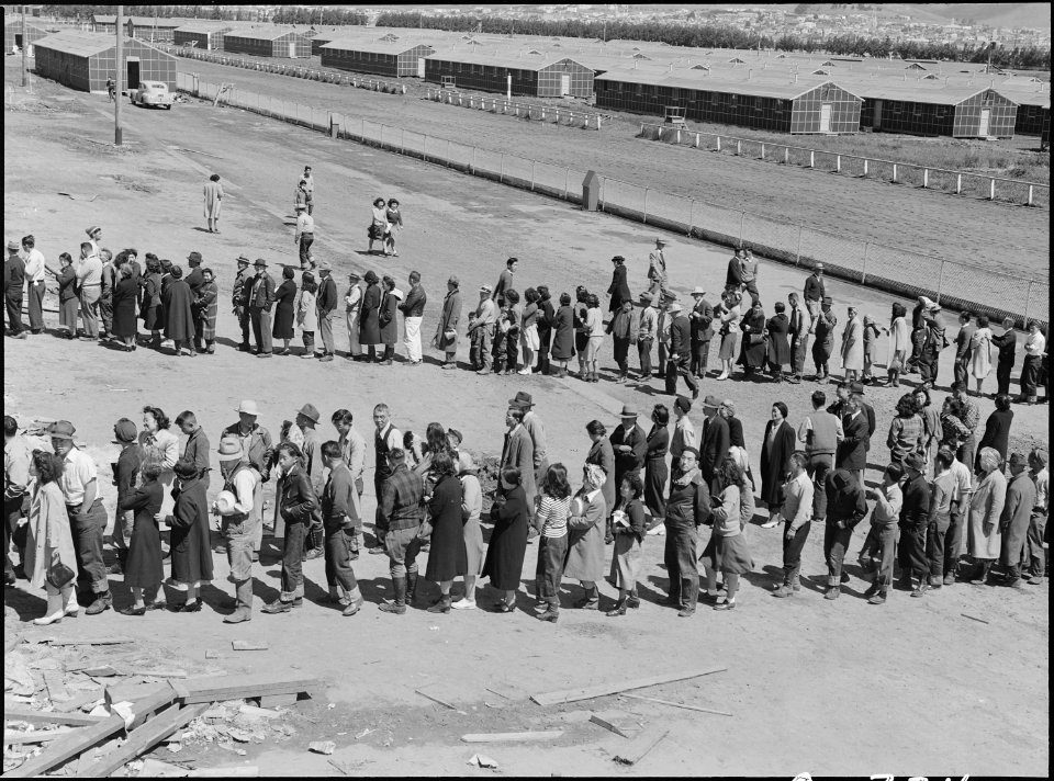 San Bruno, California. This assembly center has been open for two days. Bus-load after bus-load of . . . - NARA - 537677