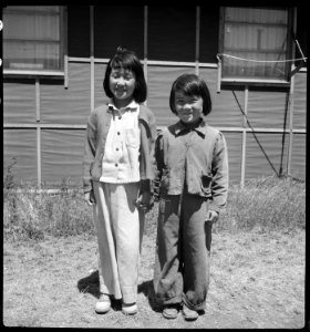 San Bruno, California. Young evacuees at this Assembly center begged to have their pictures taken. - NARA - 537907