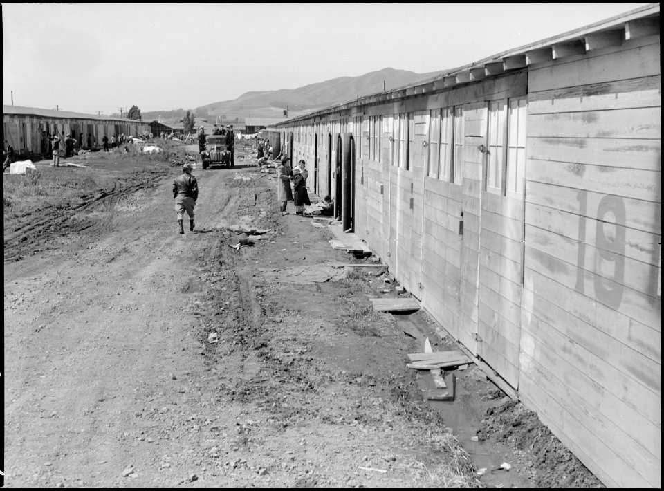 San Bruno, California. Barracks for family living quarters. Each door enters into a family unit of . . . - NARA - 537671