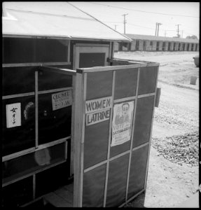 San Bruno, California. In this scene are shown sanitary facilities, campaign poster (5 Councilmen t . . . - NARA - 537948