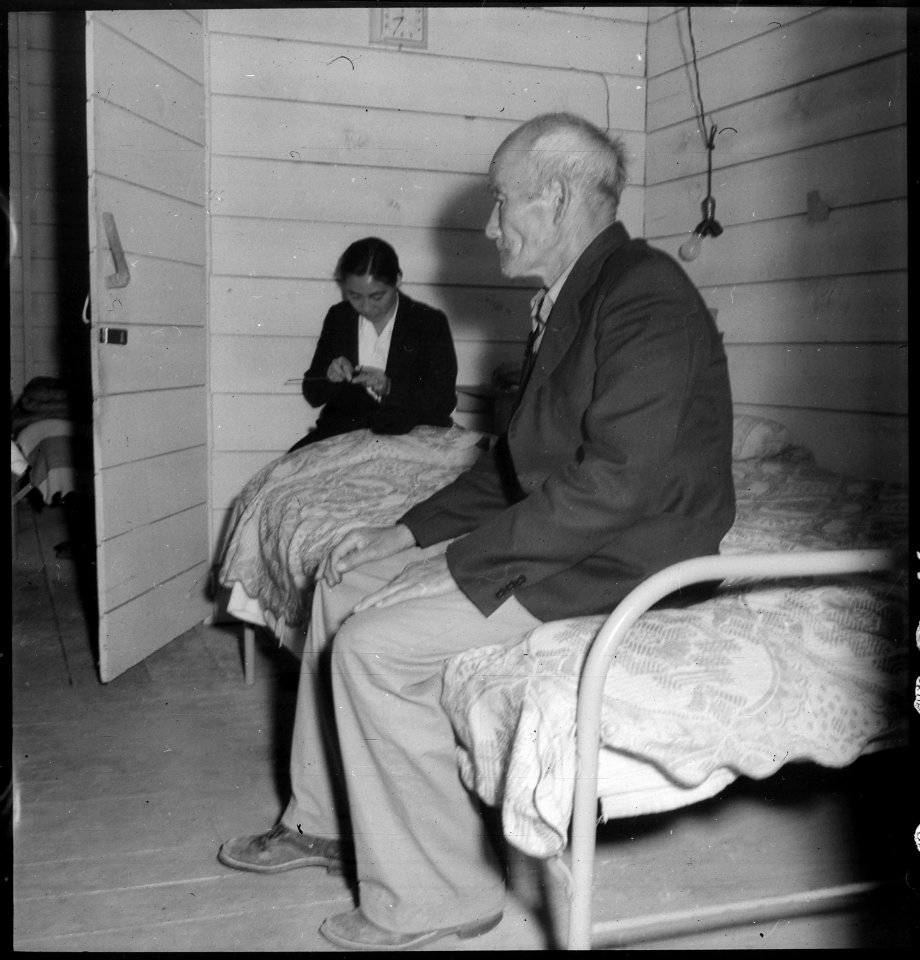 San Bruno, California. Old Mr. Konda in barrack apartment, after supper. He lives here with his tw . . . - NARA - 537894