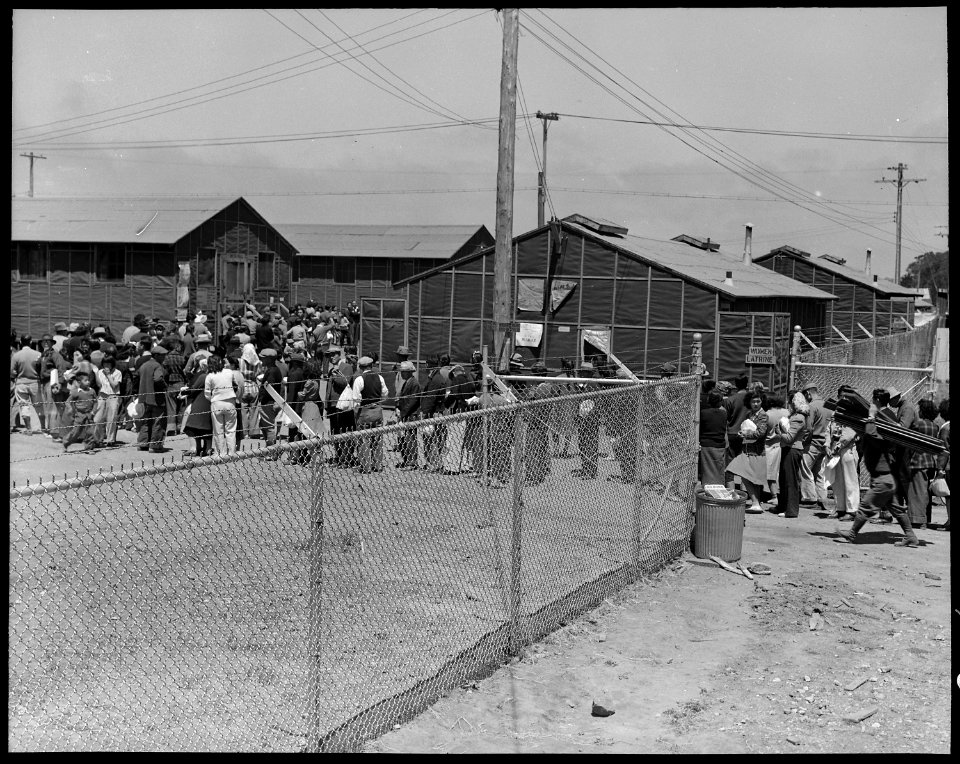 San Bruno, California. Supper time, Meal times are the big events of the day within an assembly ce . . . - NARA - 537922