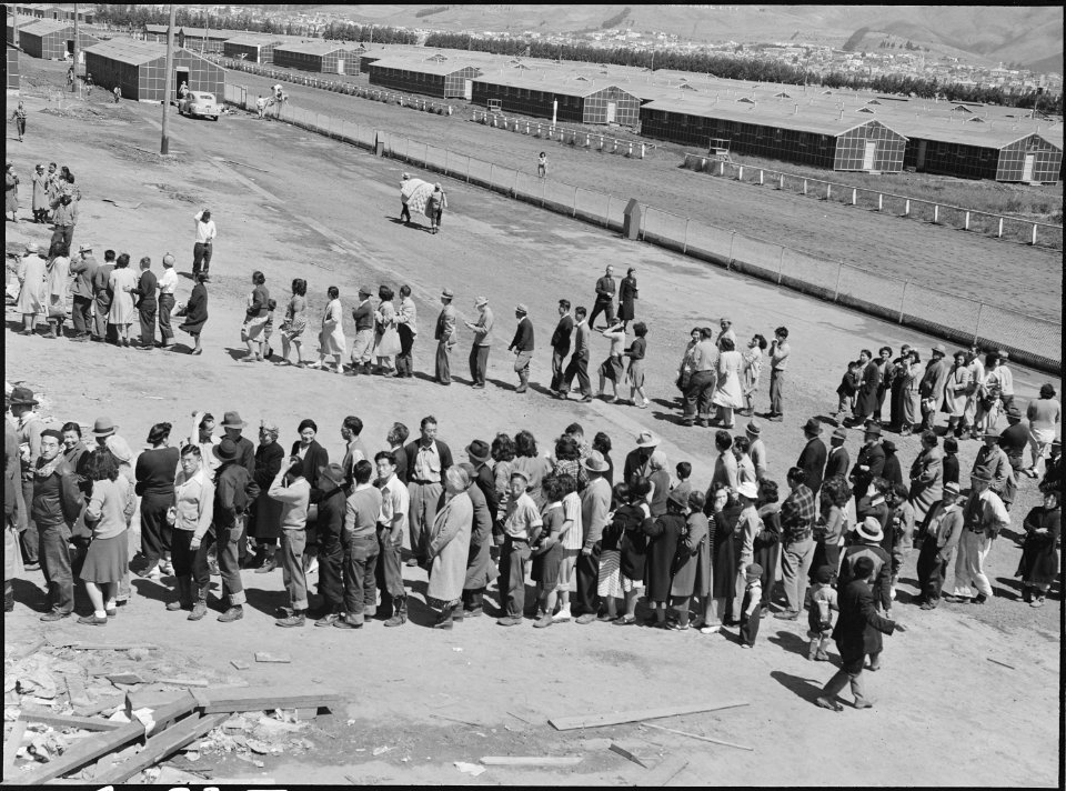 San Bruno, California. This assembly center has been open for two days. Bus-load after bus-load of . . . - NARA - 537678
