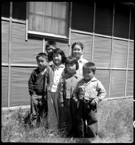 San Bruno, California. Young evacuees at this Assembly center beg to have their pictures taken. - NARA - 537908