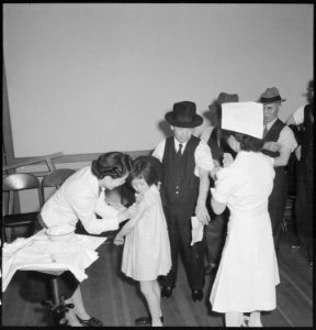 San Francisco, California. As a safeguard for health, evacuees of Japanese descent were inoculated . . . - NARA - 536395