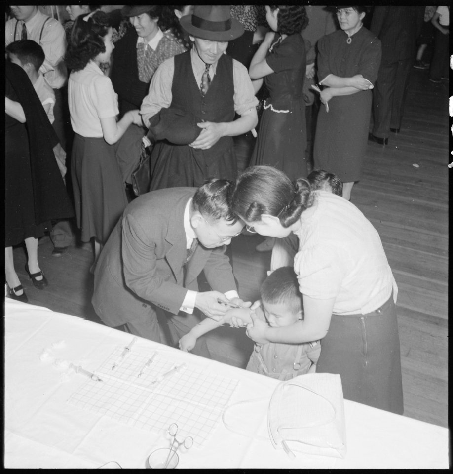 San Francisco, California. As a safeguard for health, evacuees of Japanese descent were inoculated . . . - NARA - 536397