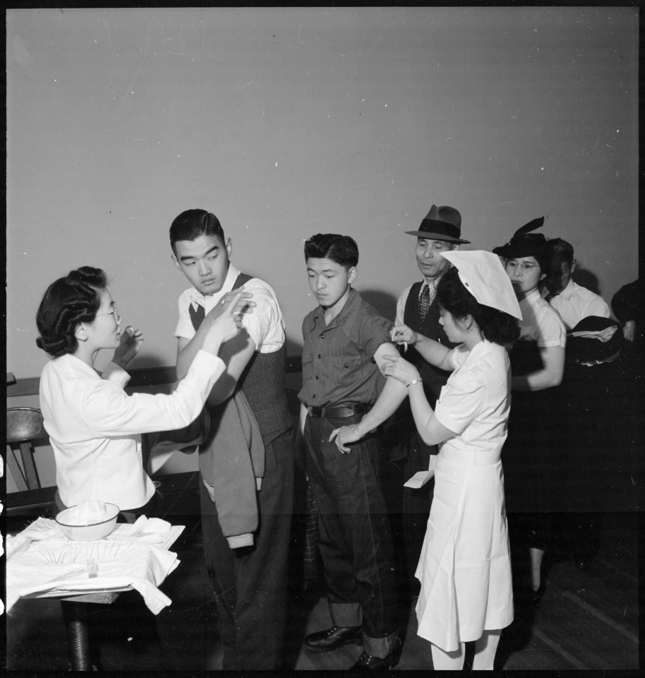 San Francisco, California. As a safeguard for health, evacuees of Japanese descent were inoculated . . . - NARA - 536396