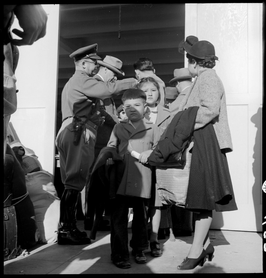 San Francisco, California. San Francisco residents of Japanese ancestry being checked by registrati . . . - NARA - 537753