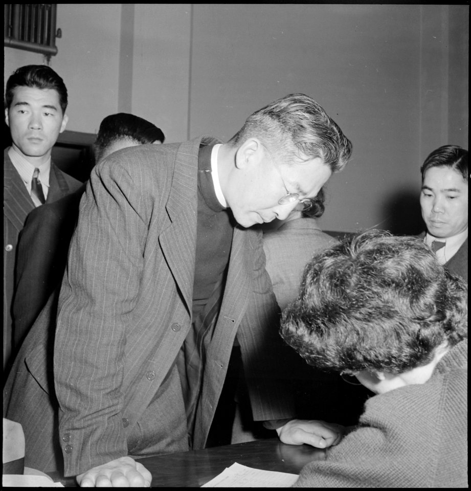 San Francisco, California. Clergyman of Japanese ancestry receives information on evacuation at 203 . . . - NARA - 536466