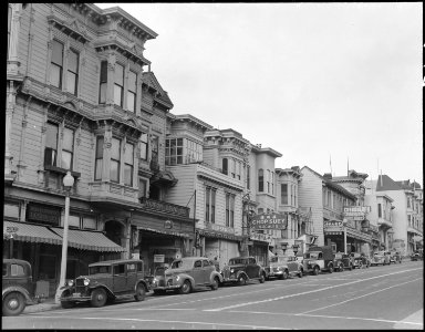 San Francisco, California. View of business district on Post Street in neighborhood occupied by res . . . - NARA - 536044 photo