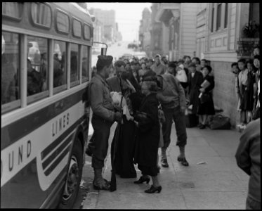 San Francisco, California. Friends and neighbors congregate to bid farewell, though not for long, t . . . - NARA - 537745