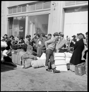 San Francisco, California. Young evacuees of Japanese ancestry awaiting evacuation bus which will t . . . - NARA - 537756