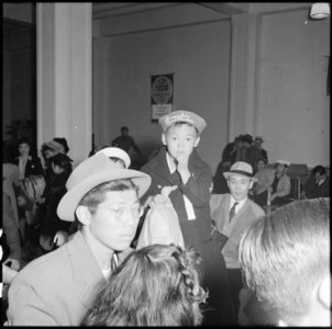 San Francisco, Califronia. The family unit is kept intact in various phases of evacuation of person . . . - NARA - 536069