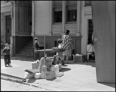 San Francisco, California. This family is preparing to move from their Bush Street home to an Assem . . . - NARA - 537687