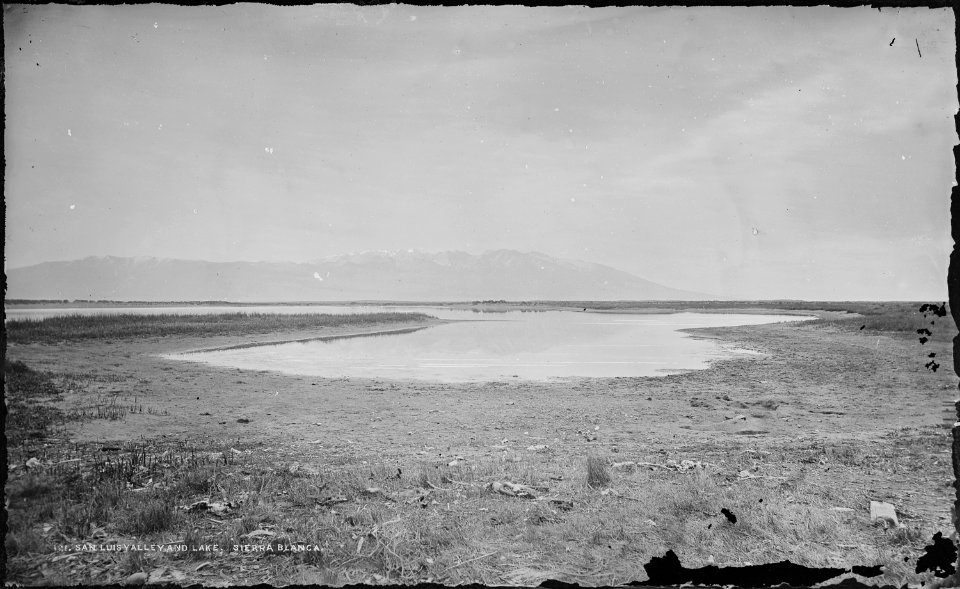 San Luis Valley and lake, with the Sierra Blanca in the distance. Alamosa County, Colorado. - NARA - 517075